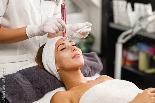 Dermapen Micro-needling Treatment In A Beauty Salon photo
