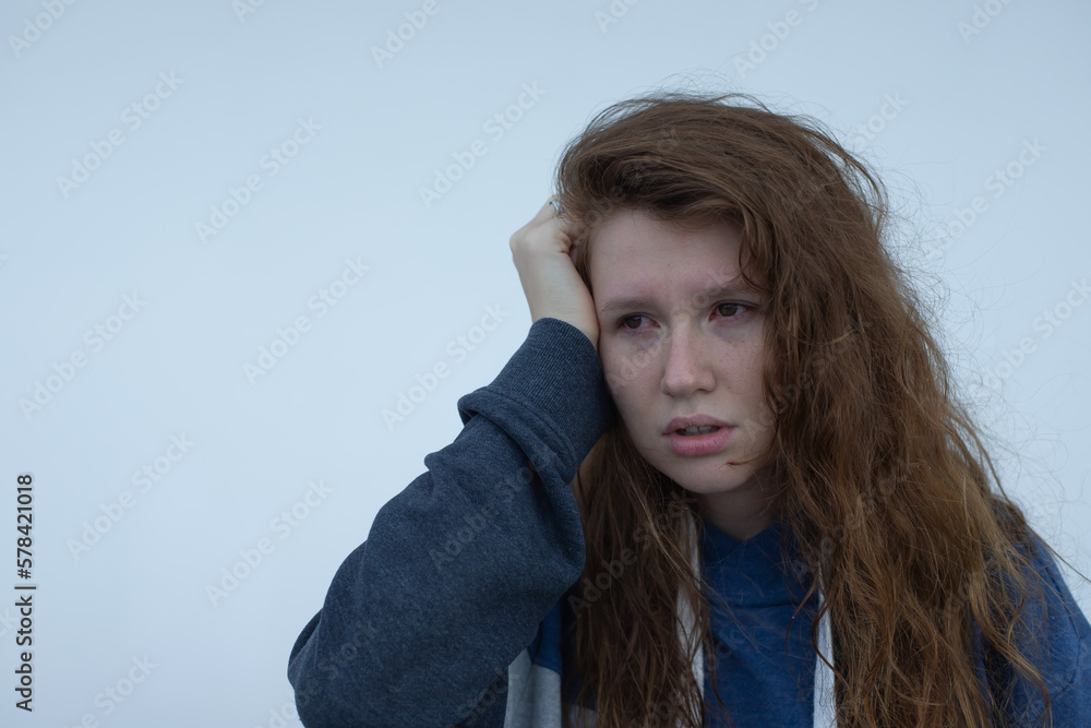 Portrait of sad depressed upset young desperate woman, crying girl with red tearful eyes with tears. Despair, depression, broken heart concept
