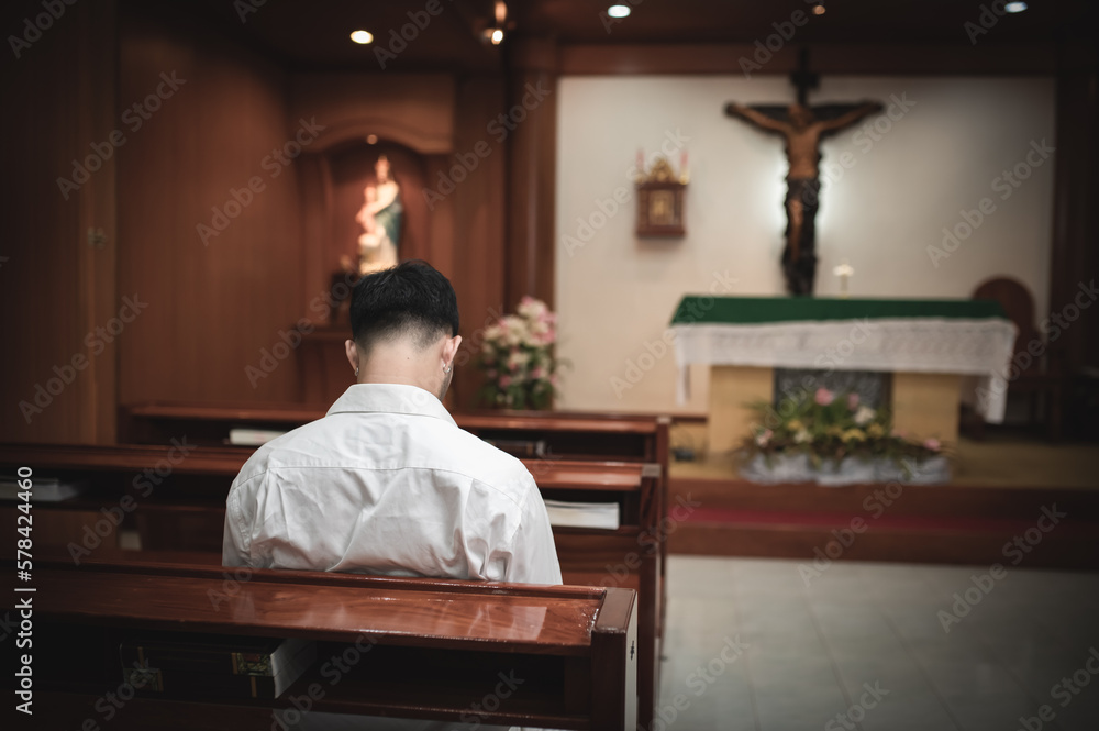 Christian man asking for blessings from God,Asian man praying to Jesus Christ Christian man asking for blessings from God,Asian man praying to Jesus Christ