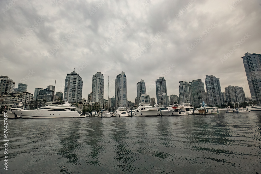 Obraz premium Granville island marina and residential buildings in Vancouver downtown Canada