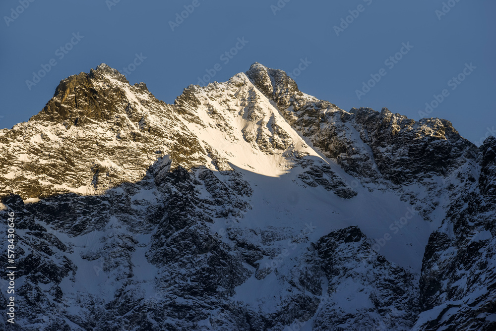 .Panorama of the Polish Tatry Mountains in winter. Mountain landscape of the snowy peaks of the Tatra Mountains in the area of ​​​​Morskie Oko.