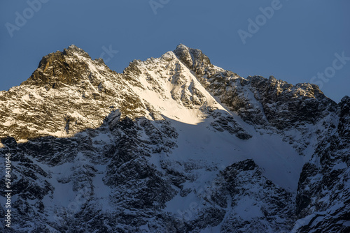 .Panorama of the Polish Tatry Mountains in winter. Mountain landscape of the snowy peaks of the Tatra Mountains in the area of ​​​​Morskie Oko.