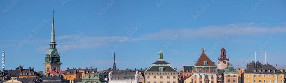 Panorama. Roofs and facades in the old town Gamla Stan, a sunny spring day in Stockholm