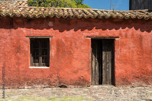 Old stone cottage painted red in Colonia del Sacramento Uruguay
