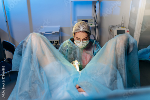 Fotografía Professional female surgeon proctologist performing operation using special devices for colonoscopy in the operating room in hospital