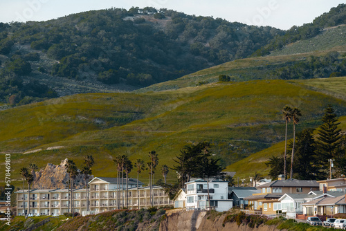 Beachfront Pismo Beach hotels and houses on the hills. Stylish accomadations with ocean view photo