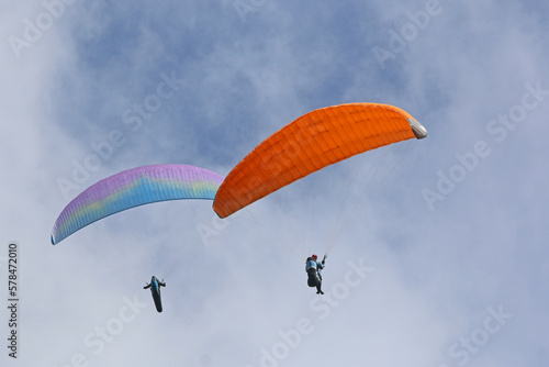 Wallpaper Mural Paraglider flying in a blue sky	 Torontodigital.ca