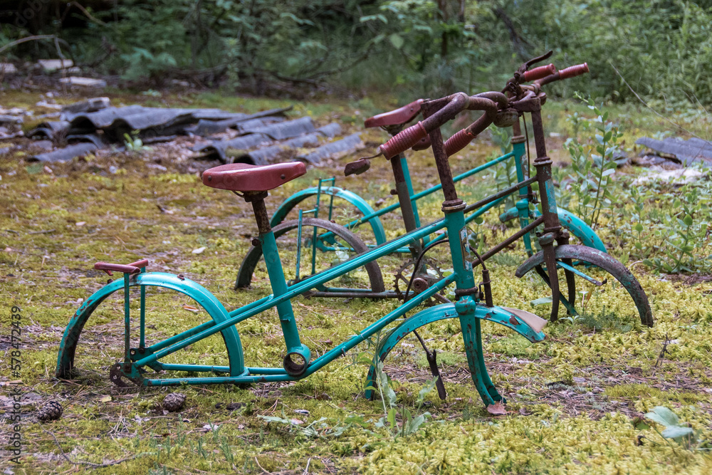 Old bike. Consequences of the accident at the Chernobyl nuclear power plant. Chernobyl zone. Nuclear danger. 