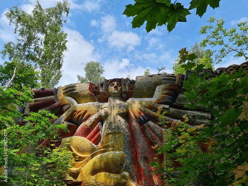 Monument in Prypyat. radioactive vehicles graveyard in Chernobyl, summer season in exclusion Zone, Ukraine- Julia 4 2021 photo