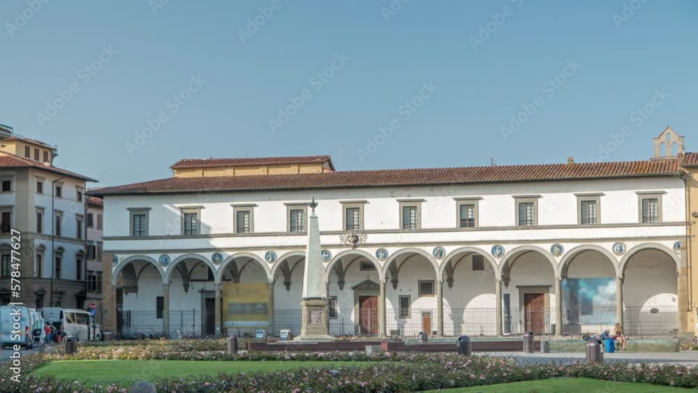 Public Square of Santa Maria Novella timelapse - one of the more important public squares in Florence. Flowerbeds and green grass. People sitting on a bench. Blue sky at summer day Public Square of Santa Maria Novella timelapse - one of the more important public squares in Florence. Flowerbeds and green grass. People sitting on a bench. Blue sky at summer day
