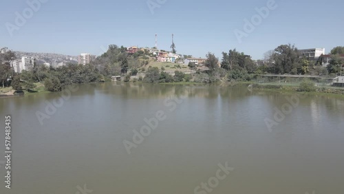 Wallpaper Mural drone flight over the center of the Sausalito lagoon, vegetation and houses around
 Torontodigital.ca