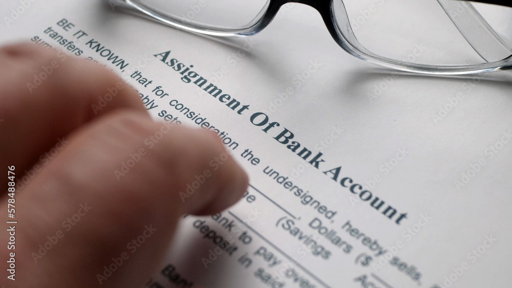 Finger tapping on assignment of bank account Finger tapping on assignment of bank account