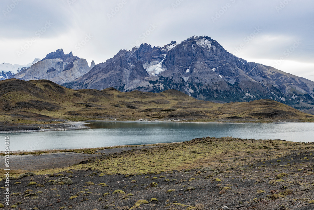 Impressive mountains and a lake with turquoise water at Torres del Paine National Park in Chile, Patagonia, South America