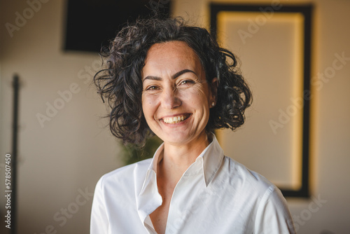 Mature caucasian woman wear white shirt happy smile portrait close up