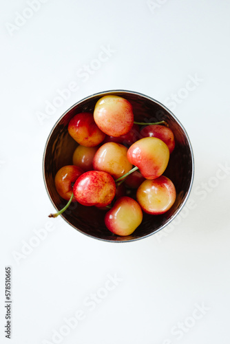 Rainier cherries in a silver bowl
