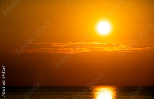 Background of sunset sky concept : Sunset or sunrise with clouds on sea © byjeng