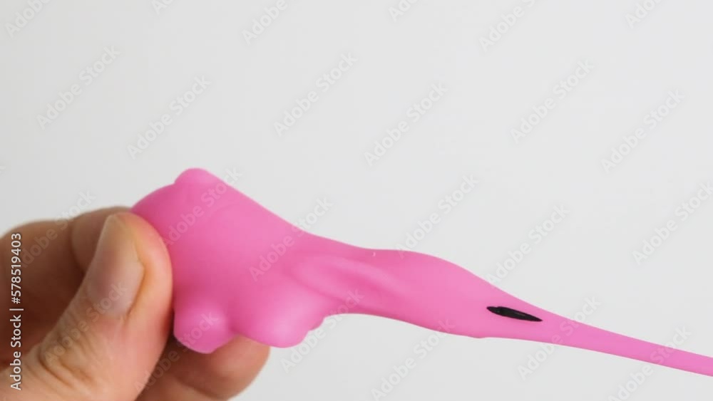 Hands are playing with anti-stress. Close up view on hands play with squash animals. The concept of relieving tension or stress in children and adults. Slow motion full HD video. Hands are playing with anti-stress. Close up view on hands play with squash animals. The concept of relieving tension or stress in children and adults. Slow motion full HD video.