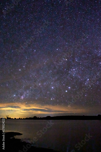 lagoon at night with sky full of stars with moonlight in the horizon, monte escobedo zacatecas 