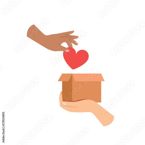Hand holding a red hearts and putting into donation box, Cardboard donation box.