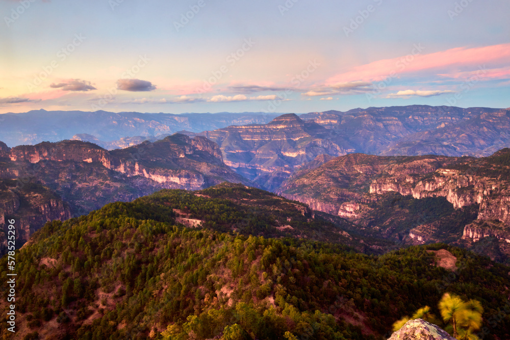mountains in pink sunset with colors in the sky, sierra madre occidental in mexiquillo durango