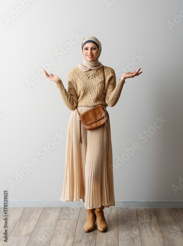 Stylish Muslim woman in bei...
