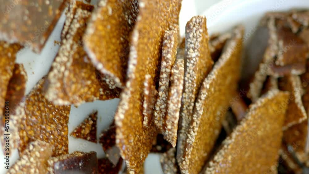 sweet caramelized almond croquettes that were baked in a food factory sweet caramelized almond croquettes that were baked in a food factory