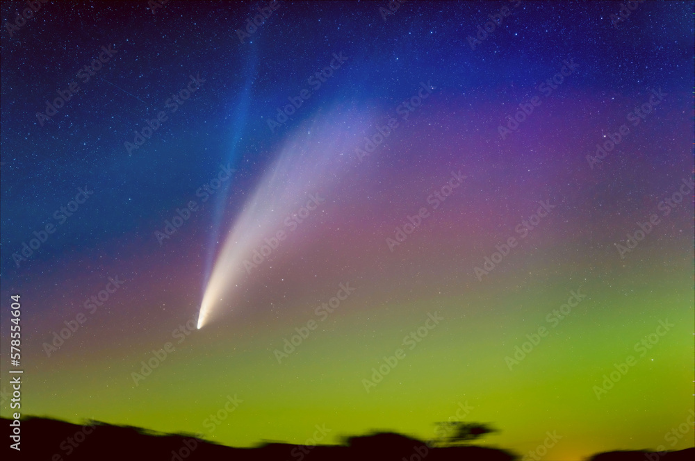 Comet Neowise against aurora borealis