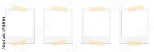 Isolated Blank White Polaroid Frames with Tape photo