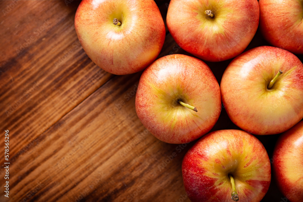 Several Royal Gala Apples (malus domestica)..Apple trees are cultivated worldwide and are the most widely used species of the genus Malus. Table top view. Several Royal Gala Apples (malus domestica)..Apple trees are cultivated worldwide and are the most widely used species of the genus Malus. Table top view.