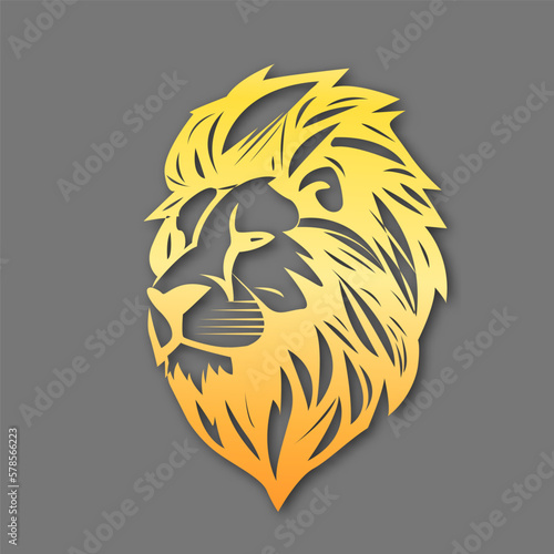A paper cut of a lion head with yellow and orange colors.
