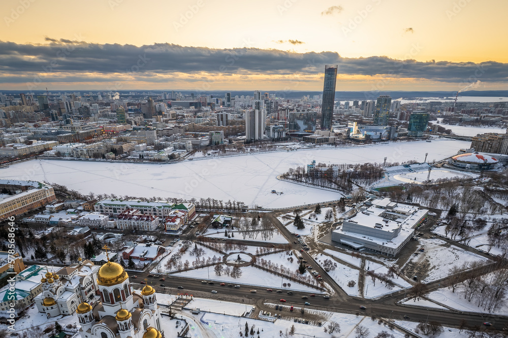 Winter Yekaterinburg and Temple on Blood in beautiful cloudy sunset. Aerial view of Yekaterinburg, Russia. Translation of the text on the temple: Honest to the Lord is the death of His saints.
