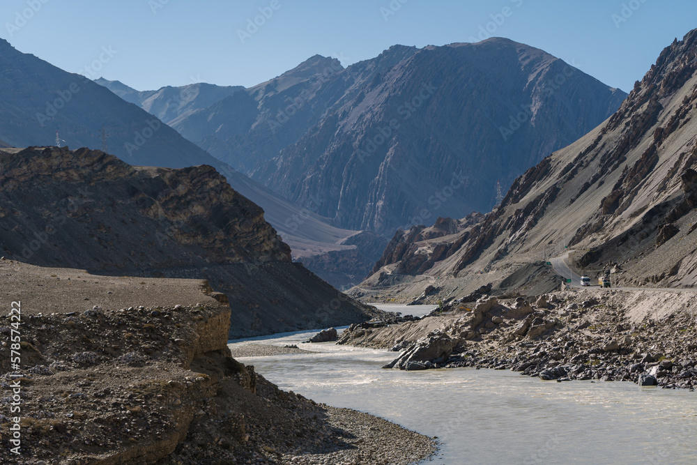 Indus river and mountains on either side at Ladakh, Himalayas, Jammu and Kashmir, Northern India