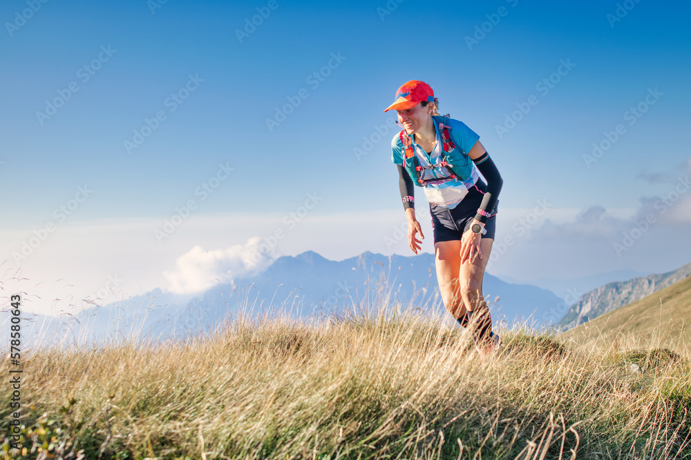 A sporty girl during an ultra trail running A sporty girl during an ultra trail running