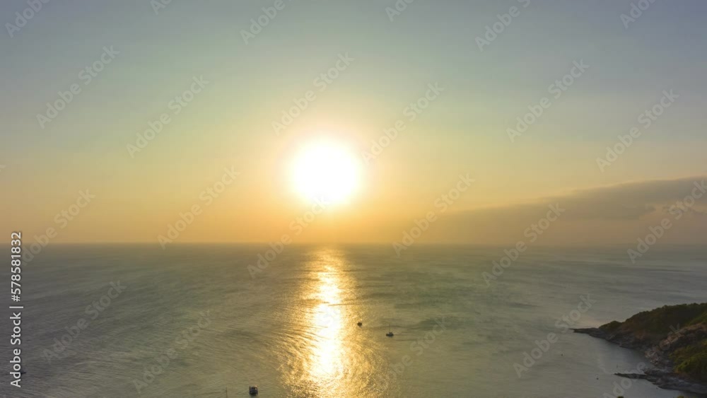 aerial hyperlapse view sunset at Laem Promthep Cape..Promthep cape viewpoint is the most popular viewpoint in Phuket island..time lapse day to night 4K video of Majestic sunset landscape. aerial hyperlapse view sunset at Laem Promthep Cape..Promthep cape viewpoint is the most popular viewpoint in Phuket island..time lapse day to night 4K video of Majestic sunset landscape.