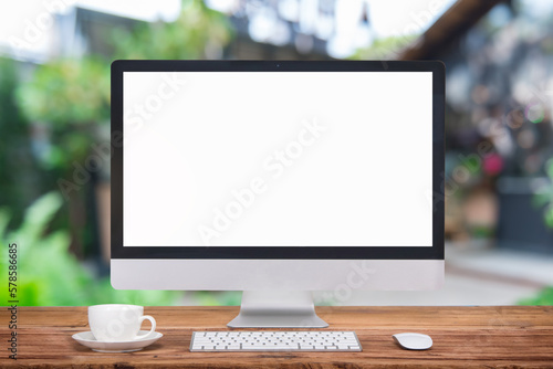 Computer Monitor, Keyboard, coffee cup