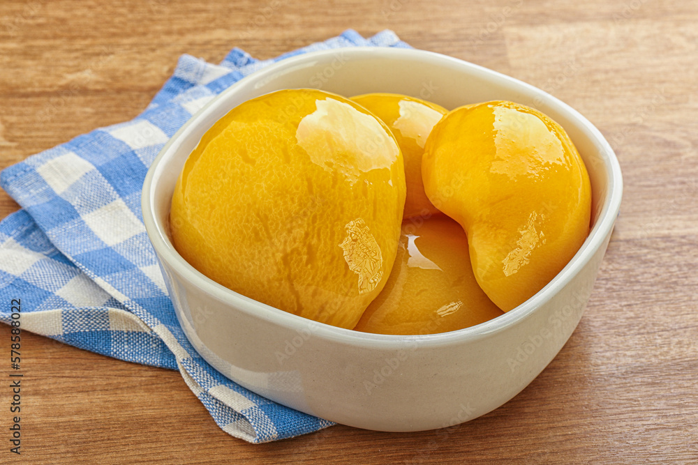 Sweet canned peaches with syrope Sweet canned peaches with syrope