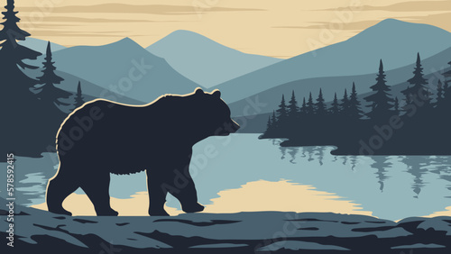 a bear is walking near a lake, forest, and mountain range
