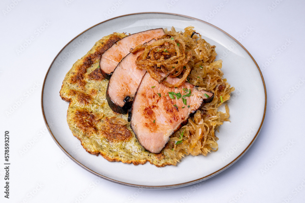 Potato pancake with smoked ham hock and apple cabbage Potato pancake with smoked ham hock and apple cabbage