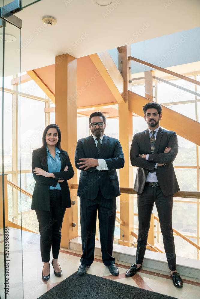 Fototapeta premium Successful indian business people giving expression at modern office.