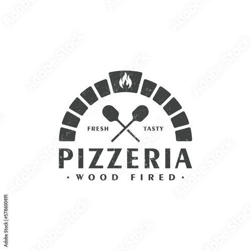 Fotografiet Wood fired brick oven with crossed shovel vintage style, pizza logo design vector