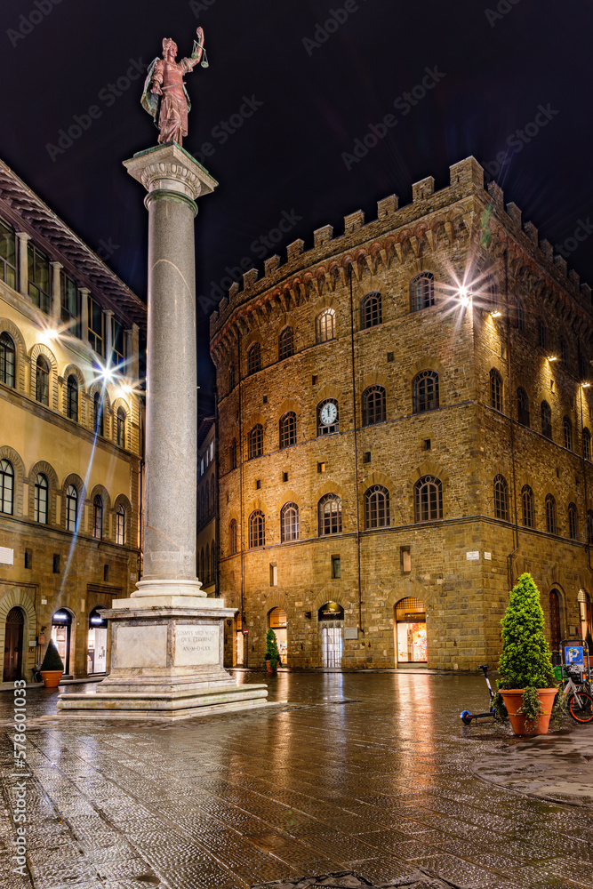 Colonna della Giustizia at the Piazza Santa Trinita in Florence, Tuscany, Italy, on a rainy night.