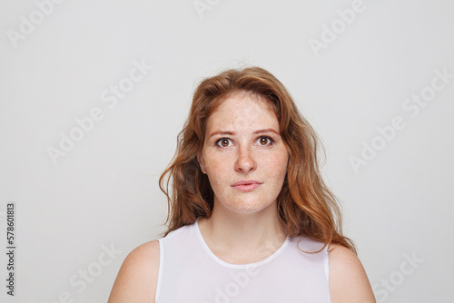 Female face. Beautiful redhead woman portrait