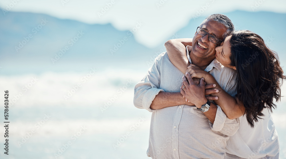 Love, romance and mature couple on beach, embrace and kiss with happy relationship and mockup. Romantic retirement vacation, senior woman and man hugging on tropical ocean holiday travel with smile. Love, romance and mature couple on beach, embrace and kiss with happy relationship and mockup. Romantic retirement vacation, senior woman and man hugging on tropical ocean holiday travel with smile.