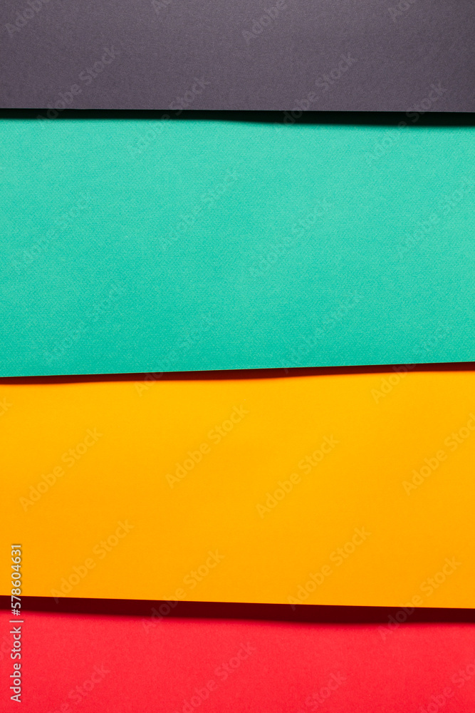 Geometric composition made of brightly colored cardboard on top of each other. Geometric composition made of brightly colored cardboard on top of each other.