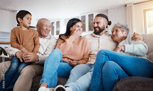 Relax, bonding and generations of family on sofa together, laughing and smiling in home or apartment. Men, women and children on couch, happy smile with grandparents, parents and kid in living room.