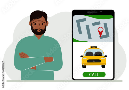 A man next to a large smartphone on the screen which has a taxi and geolocation. The concept of a mobile taxi application or ordering a taxi online.