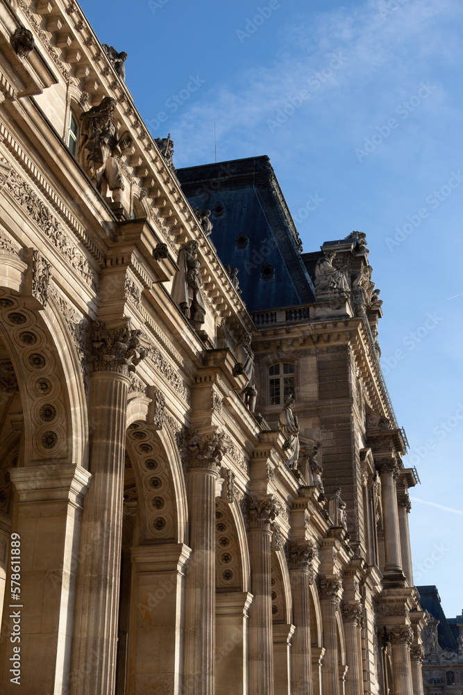 the facade of the louvre museum