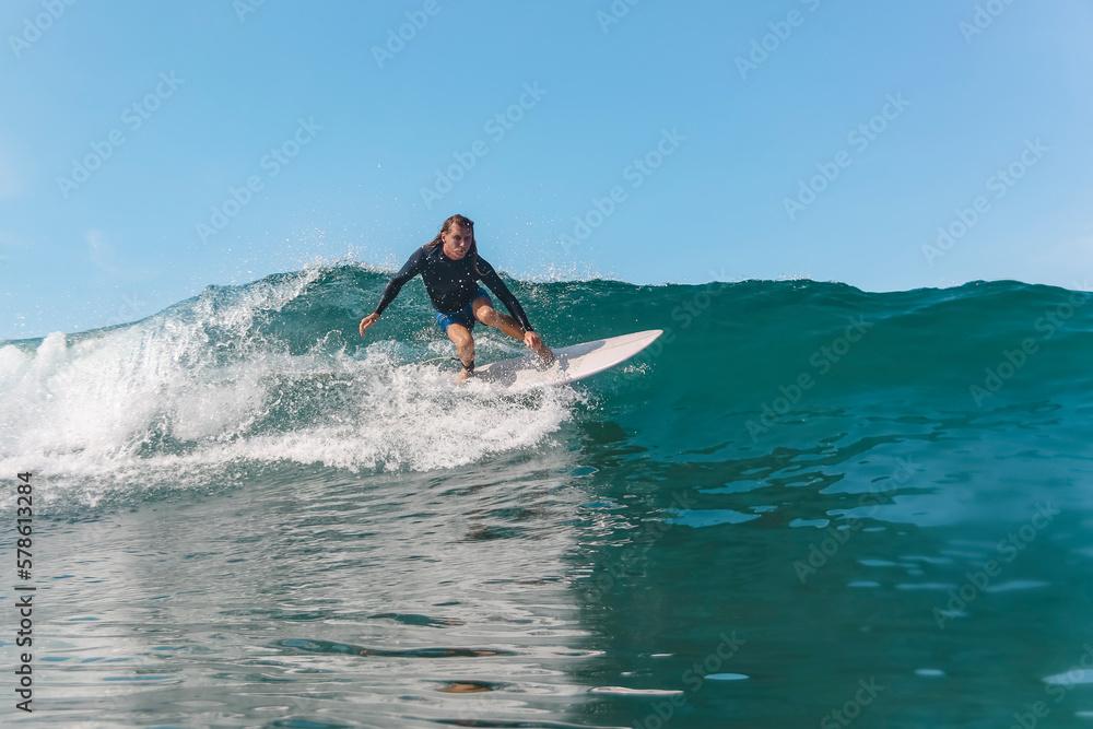 Low angle view of man surfing in sea against sky Low angle view of man surfing in sea against sky