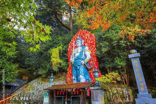 Fukuoka, Japan - Nov 21 2022: Fudou Myouou is a fierce Buddhist deity said to protect worshipers from disasters or harm at Nanzoin Temple photo