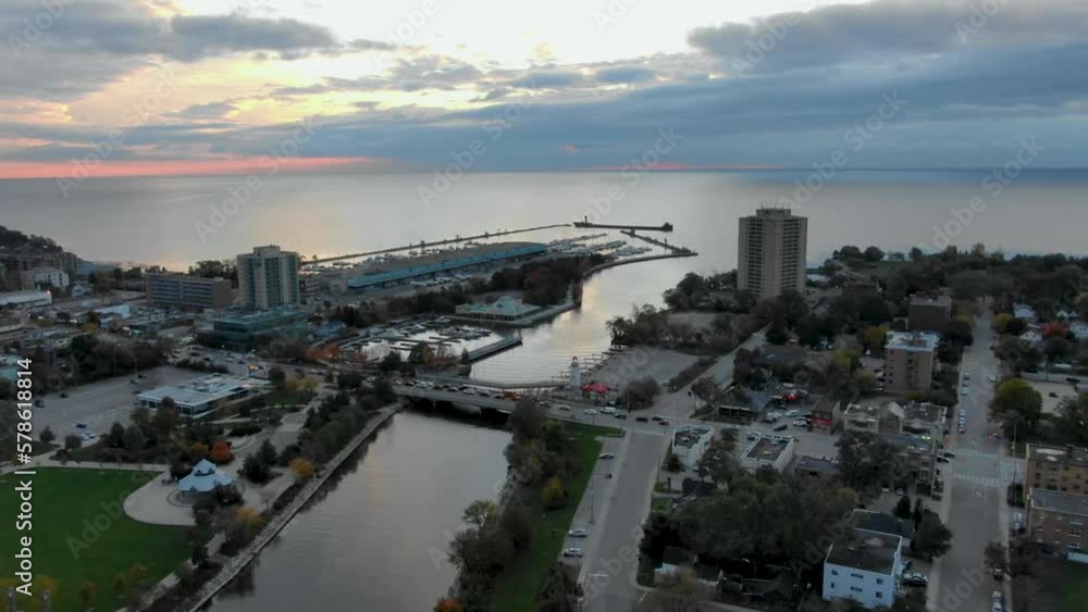Sunrise drone shot circling around a Mississauga harbor. Sunrise drone shot circling around a Mississauga harbor.